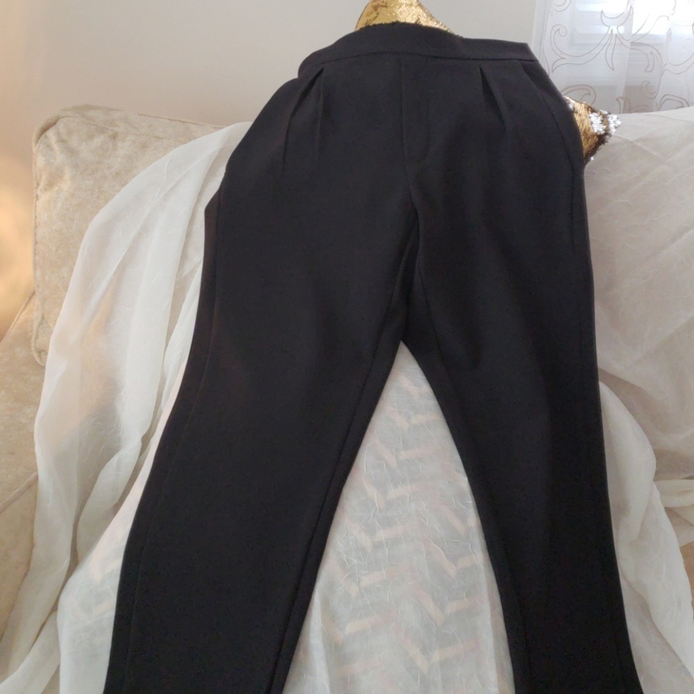 Pleated front skinny leg pants